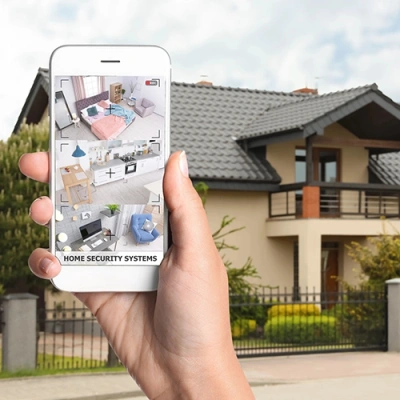 Missoula vivint phone display of cctv live feed in front of a house